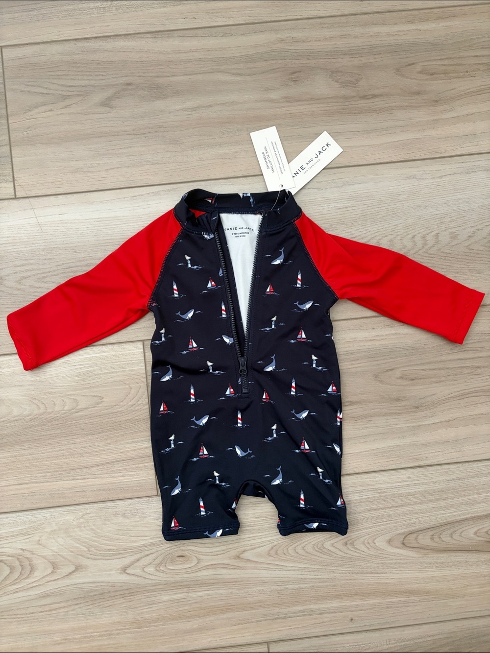 Janie and Jack Navy One-Piece Rashguard with Red Sleeves